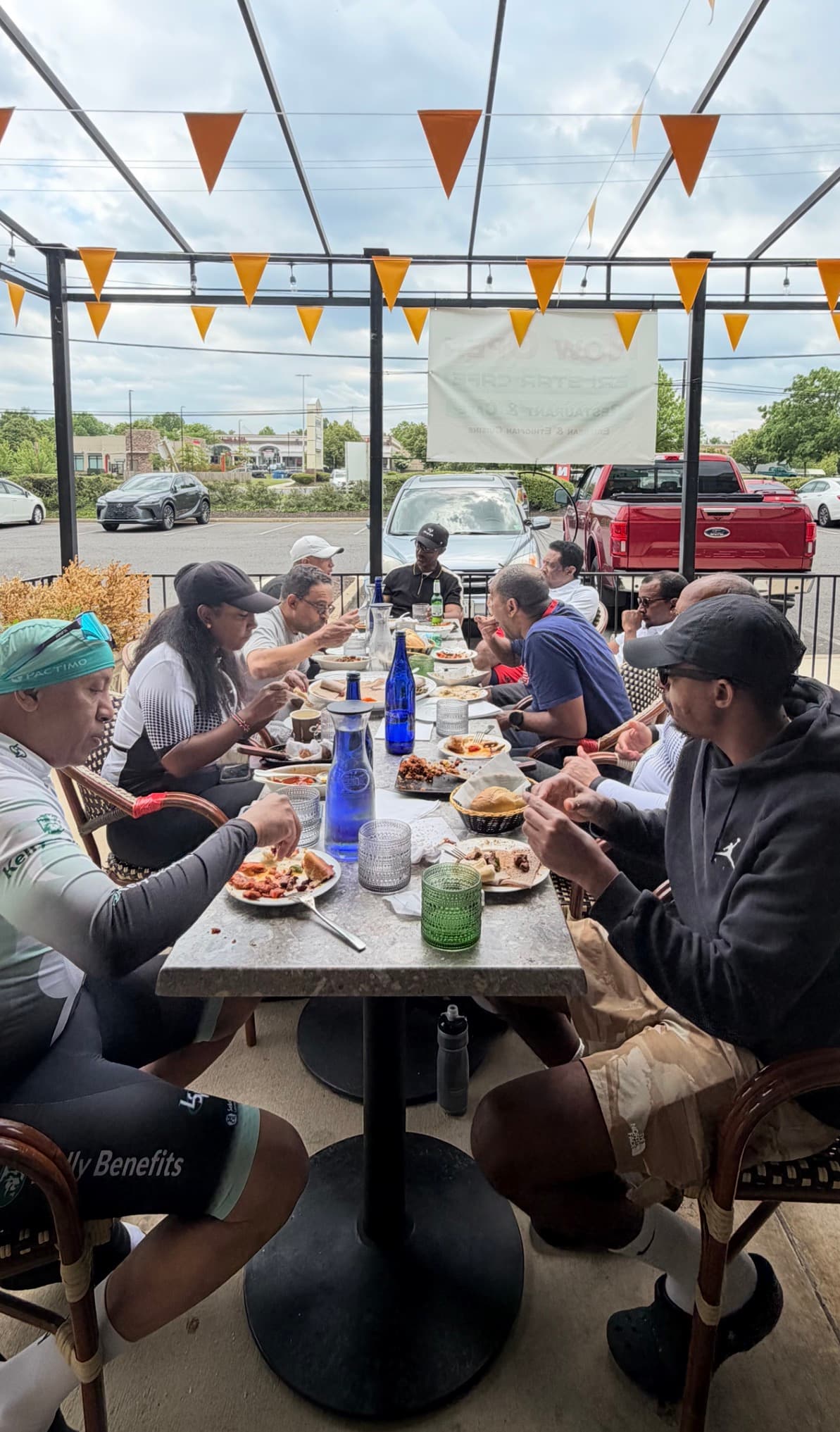 Family enjoying an Ethiopian meal together at Eri Star Cafe